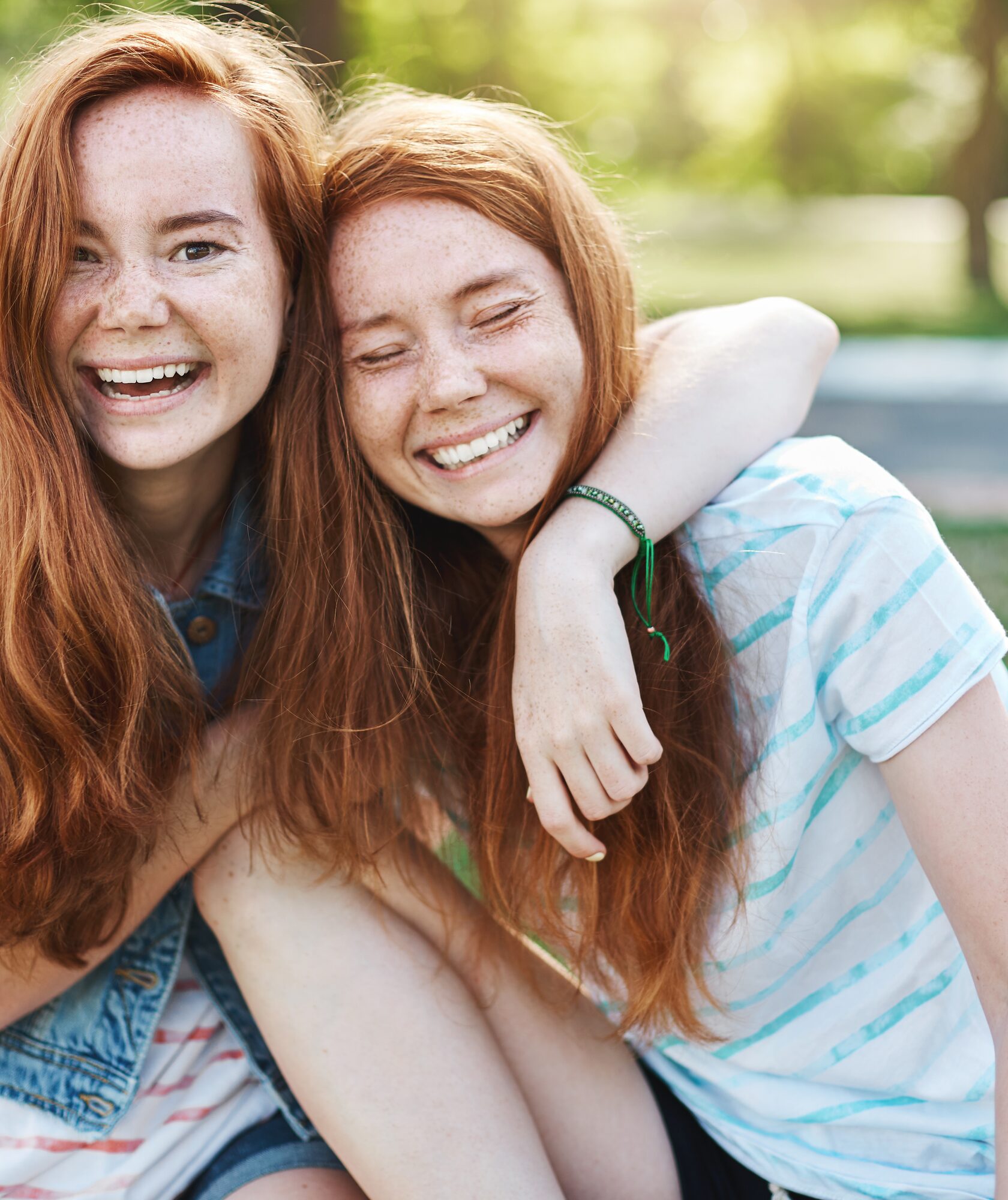 Two sisters smiling outdoors - convenient orthodontic care for Union City families